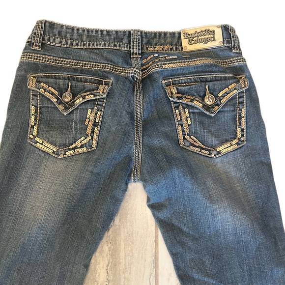 Rock & Roll Cowgirl Dark Blue Bootcut Jeans with Gold Sequin Trim - Picture 4 of 15